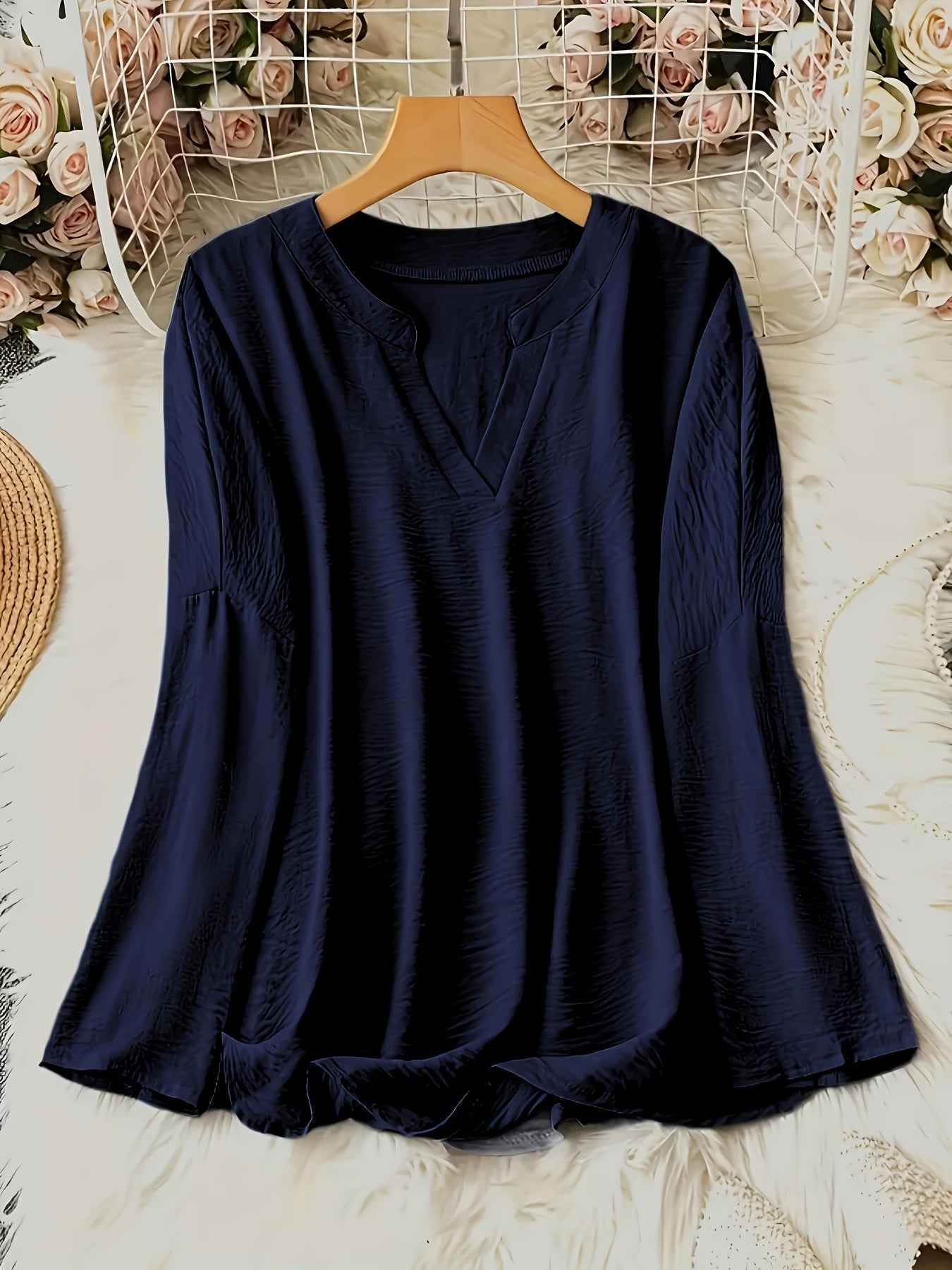 Bria - Blusa a V in tessuto leggero