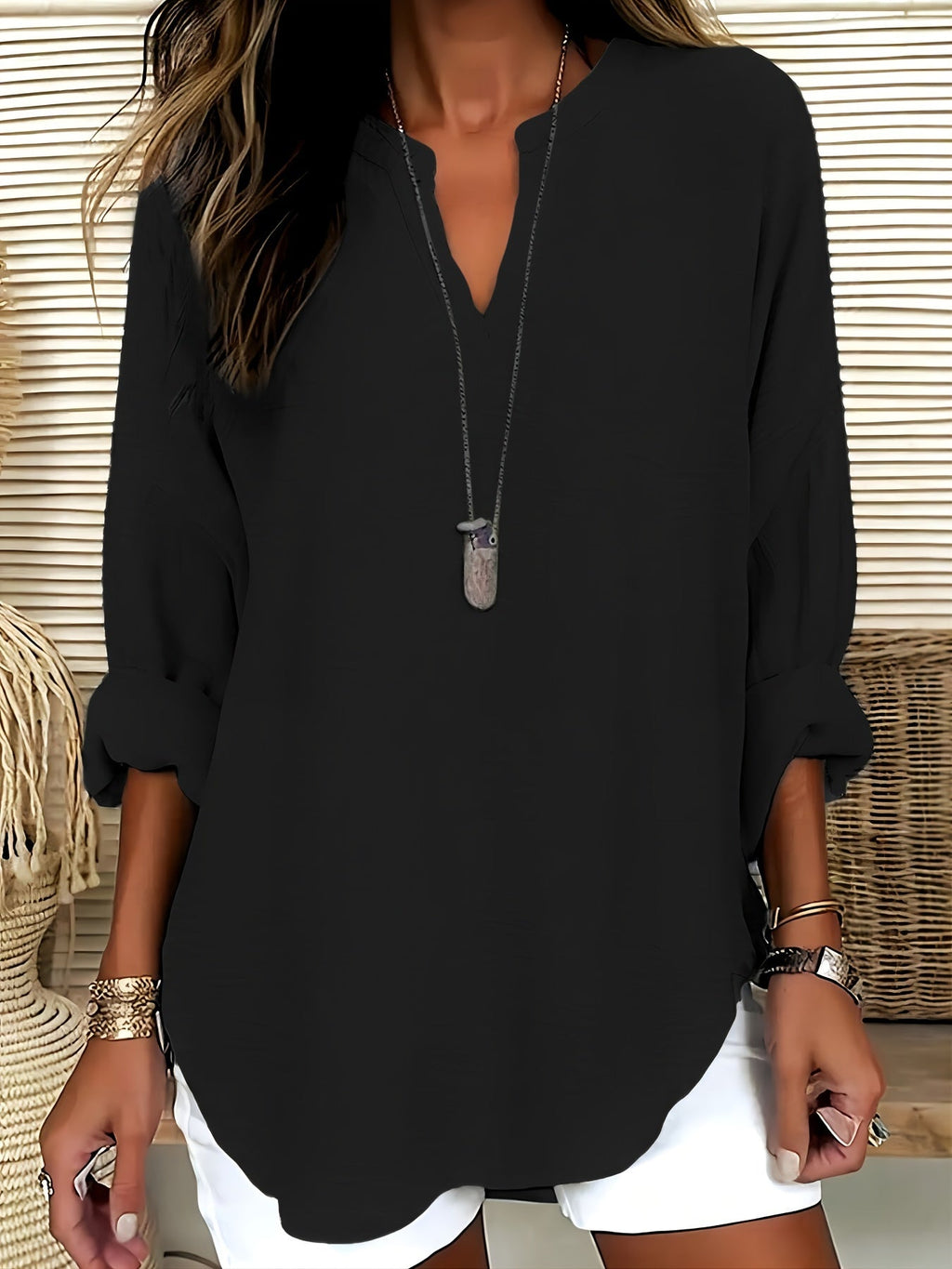 Bria - Blusa a V in tessuto leggero